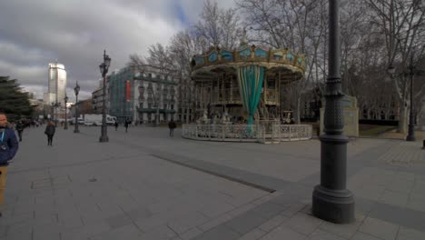 Carrousel,-Mery-go-round-in-Plaza-de-Oriente,-Palacio-Real