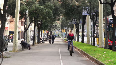 People-walking-by-in-Diagonal-in-Barcelona,-Spain