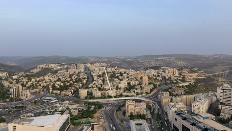 Jerusalem-Chords-bridge-over-the-main-road,-entrance,-aerial-shot,-drone
