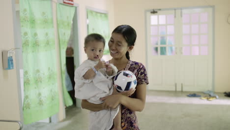 burmese-mother-and-child-looking-into-the-camera