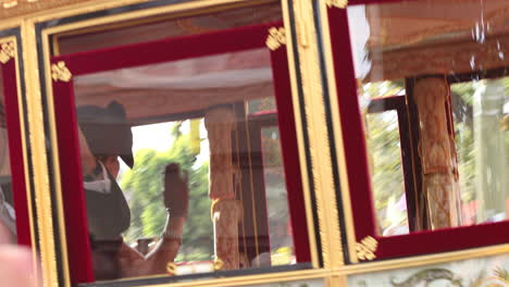 King-Willem-Alexander-and-Queen-Maxima-of-the-Dutch-royal-family-passing-by-in-horse-and-carriage-waving-at-the-crowds-along-the-pathway-from-the-House-of-Representatives-to-the-Noordeinde-Palace