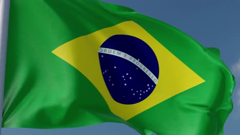 Die-Brasilianische-Nationalflagge-Weht-Im-Wind-Mit-Einem-Blauen-Himmelshintergrund-Aus-Nächster-Nähe