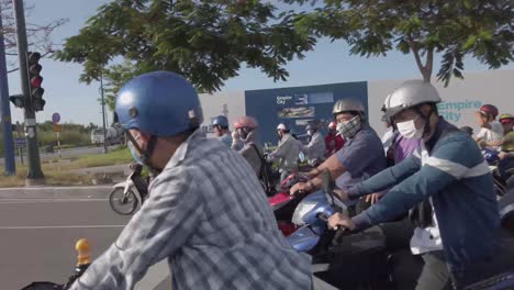 Early-morning-stabilized-POV-shot-in-4k-60fps-of-Motor-scooter-traffic-on-the-streets-of-Ho-Chi-Minh-City-Vietnam