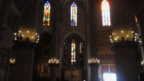 Pan-Down-From-Ceiling-to-Door-Opening-Revealing-Beautiful-Cathedral-in-a-Dreamy-State