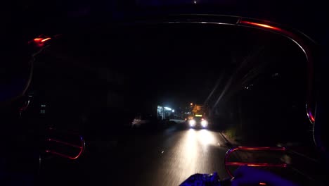 Wide-angle-shot-at-the-back-of-a-songthaew-bus-during-the-day-in-Thailand