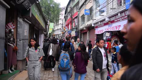 Slow-Motion-Shot-of-People-walking-in-the-famous-market-street,-Mall-Road