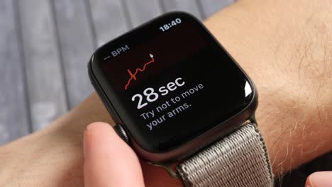 Man-doing-an-Electrocardiography-on-his-smart-watch
