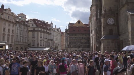Crowd-of-Tourists-Leaving-the-Astronomical-Clock-in-the-Old-Town-Square-of-Prague,-Czech-Republic