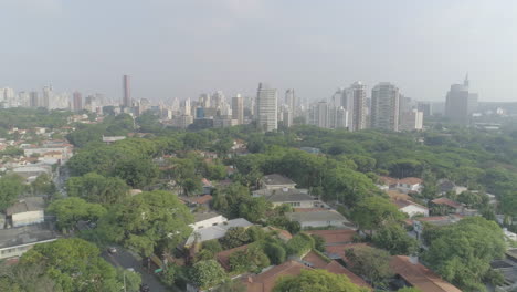 Aerial-of-Vila-Madalena-Neighbourhood-in-Sao-Paulo-city,-Brazil,-showing-trees-and-buildings-on-the-background