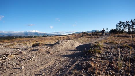 Man-on-Mountain-Bike-Catches-Air-on-Dirt-Trial