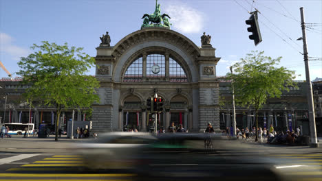 Luzern-Switzerland,-circa-:-Timelapse-crowded-people-old-railway-station-gate-in-Luzern-City,-Switzerland