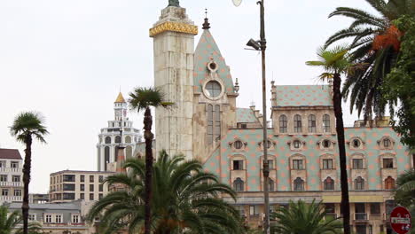 Pink-polka-dot-roofed-building-with-tower-in-Batumi,-Georgia