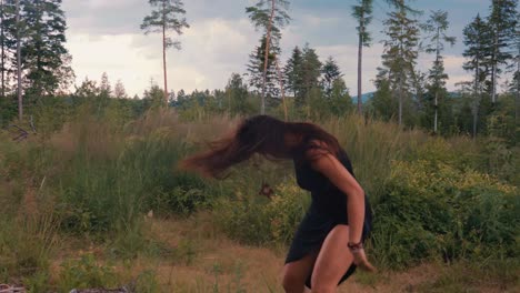 Adult-Female-Dancing-Carefree-In-Woodland-Grassland