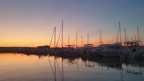 Wonderful-sunset-over-Marina-Sveva-touristic-port.-Slow-motion