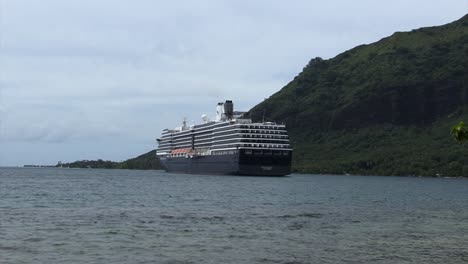 Cruise-ship-anchored-in-Opunohu-Bay,-Moorea-island,-French-Polynesia