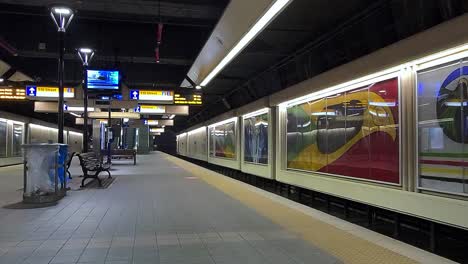 Typical-Busy-Saturday-Night-on-the-Subway-Platform-where-night-clubbing-adults-mingle-headed-dancing-drinking-instead-during-COVID-19-lockdown-pandemic-its-quiet-with-nobody-out-accept-staff-security