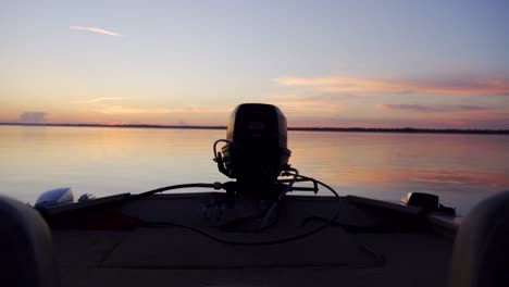 "Eustis,-FL---USA---8-20-2020:-A-twilight-shot-of-the-aft-of-a-fishing-boat-in-Lake-Eustis