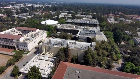 Aerial-view-overlooking-the-CalTech-Institute,-on-a-sunny-day,-in-Pasadena,-Los-Angeles,-USA---dolly,-drone-shot