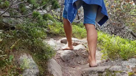 People-Walking-With-Bare-Foot-On-Rocky-Trail-In-Rila-Mountain,-Bulgaria---cropped-shot,-tracking