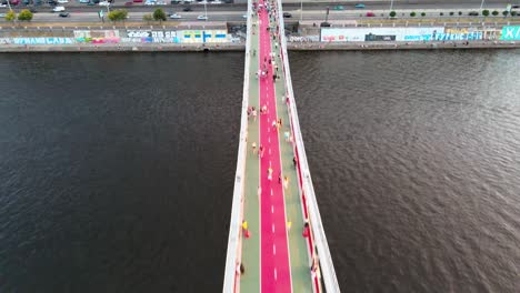 Aerial-overhead-view-of-the-Parkovy-pedestrian-bridge-over-the-Dnipro-river-in-Kiev