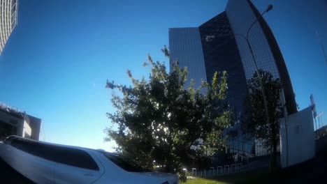 Entrance-to-the-car-park-between-modern-buildings-on-a-sunny-day