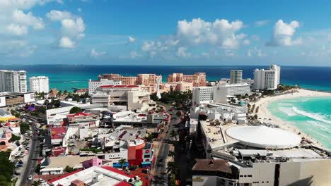 Aerial-shot-of-Cancun-Hotel-Zone-with-the-skyline-in-the-background