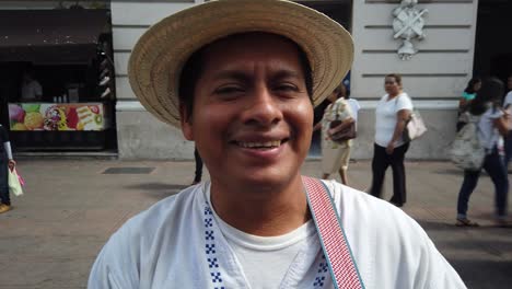 Closeup-on-guitar-panning-up-to-face-of-mariachi-musician-and-singer