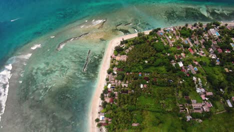 Birds-eye-view-of-a-beautiful-coastline-with-the-incoming-waves