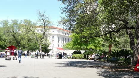 Tourist-in-downtown-San-Antonio-in-the-square-outside-the-Alamo-on-a-beautiful-sunny-day