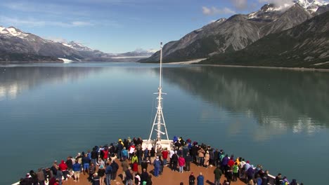 Cruise-ship-in-Glacier-Bay-National-Park-Alaska,-tourists-enjoying-the-landscape