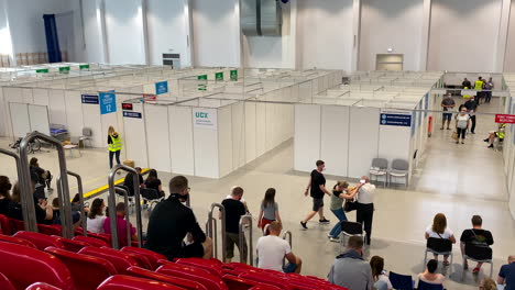 People-waiting-after-vaccine-in-main-vaccination-centre-in-Gdańsk,-UCK