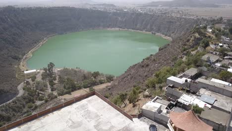 Shot-of-the-church-passing-between-the-towers-and-showing-the-lagoon-of-Aljojuca