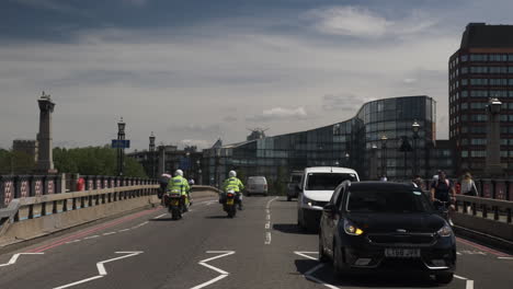 Looking-Across-Lambeth-Bridge-Over-River-Thames-With-Traffic-Going-Past