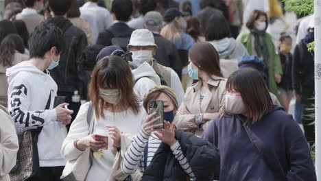 Ancient-Japanese-Tradition-With-Scene-Of-People-Attending-Sakura-Festival-During-Covid19-Pandemic-In-Tokyo,-Japan