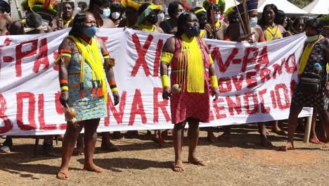 Females-from-indigenous-tribes-of-the-Amazon-rainforest-protest-in-Brazil's-capitol,-Brasilia