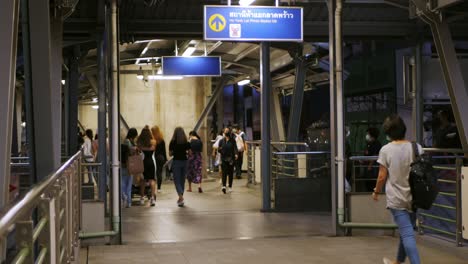 Skywalk-connecting-the-sky-train-station-on-the-main-road-in-Lat-Phrao-area,-Bangkok,-Thailand