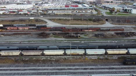 AERIAL---Train-cars-sit-still-in-yard