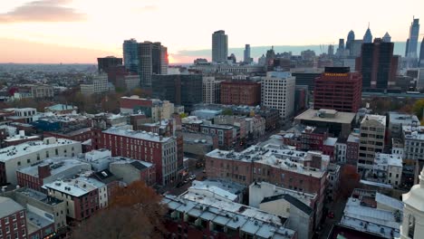 Cinematic-truck-shot-Christ-Church-steeple-and-Philly-skyline-at-sunset