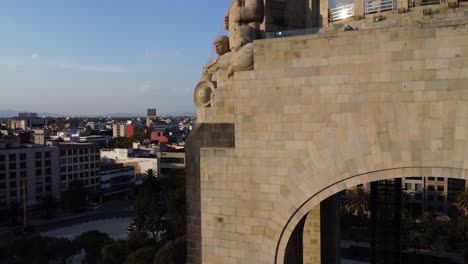 Crane-Shot-of-the-Monument-to-the-Revolution-Revealing-the-Northern-Part-of-Mexico-City