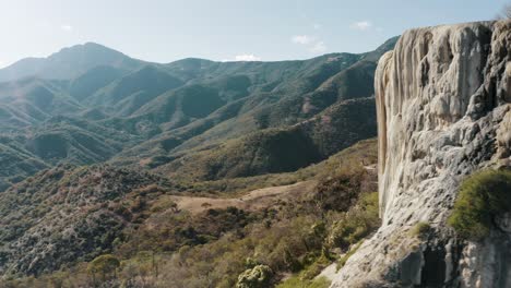 Aerial-view-of-Hierve-el-agua,-rock-formations-in-San-Lorenzo-Albarradas,-Oaxaca,-Mexico