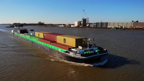 Aerial-Starbaord-View-Of-Sendo-Liner-Inland-Freighter-Along-Der-Lek-In-Groot-Ammers