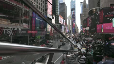 Crowds-of-people-enjoying-themselves-in-Time-Square-in-Manhattan