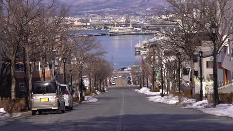 Slow-tilt-up-over-famous-hachiman-zaka-slope-in-Hakodate-City,-Japan