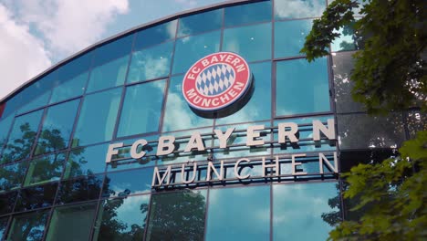 Emblem-of-FC-Bayern-Munich-on-glass-facade-at-the-club-headquarters