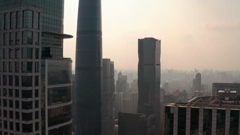 Beautiful-cinematic-view-of-Guangzhou-CDB-downtown-area-at-colorful-golden-sunset