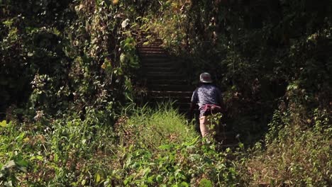 Male-Traveller-Climbing-Rock-Steps-At-Sitakunda-In-Bangladesh