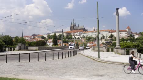 Prague,-Czech-Republic,-Traffic-on-Manes-Bridge,-Castle-and-St