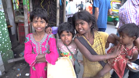 Poor-and-hungry-Indian-children-looking-at-camera-begging-for-money,-uneducated-innocent-orphan-children