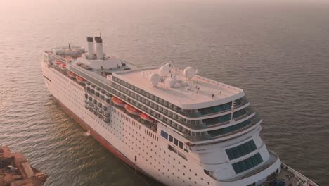 Aerial-Of-Cruise-Ship-Beached-At-Gadani-Against-Sunset-Light