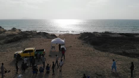 Aerial-View-Of-Film-Production-Crew-On-Beach-At-Balochistan